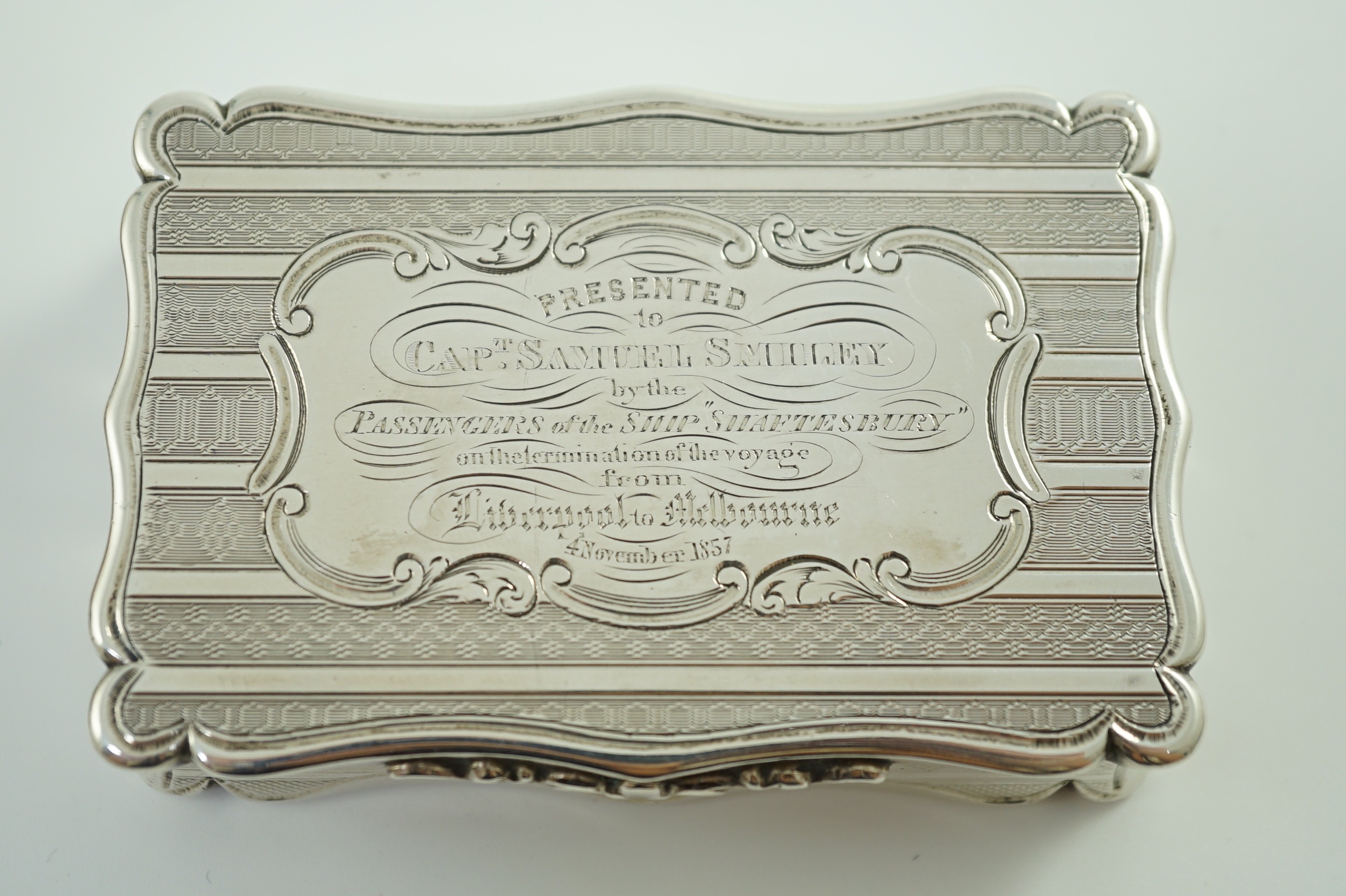 Australian naval interest - A Victorian engraved silver presentation snuff box, inscribed 'Presented to Capt. Samuel Smiley by the Passengers of the Ship Shaftesbury on the Termination of the Voyage from Liverpool to Mel